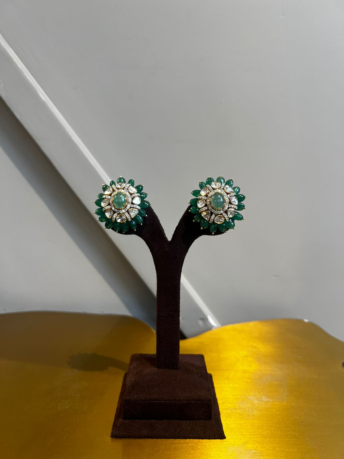 Beautiful Polki earrings studded with Emerald Beautiful Polki earrings studded with Emerald